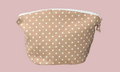 Beige dot cosmetic travel pouch for makeup, skincare and beauty essentials